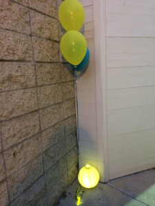 Balloons outside a door